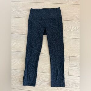 Lululemon pace rival leggings size 4 leopard camo deep coal luxtreme